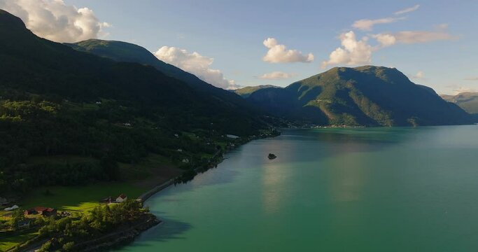 Mountainscape Background In Lustrafjorden And Luster Village In Vestland County, Norway. Aerial Drone Shot