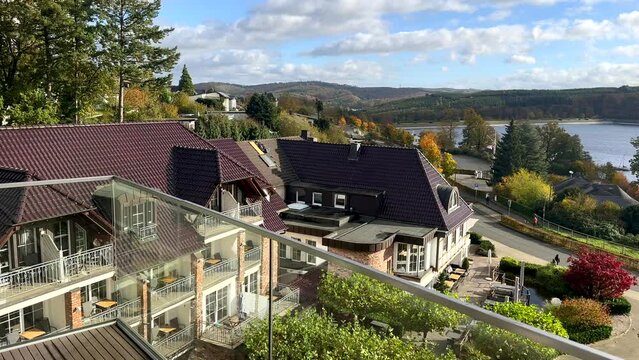 Panorama view of Sorpesee Sorpe Dam with green hills during sunny day- View from luxury German Seegarten Hotel in Germany
