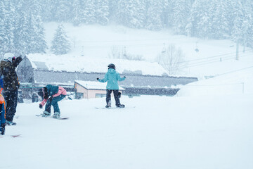 People playing Ski and Snowboard in winter season. Snow winter activity concept