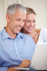 Mature couple, laptop and smiling with video call, conversation and living room couch. Social media, technology and communication with family, man and woman with connection, streaming and happy