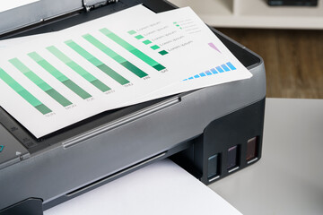 Close up of modern printer in the office