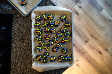 Colorful Dark Chocolate Cookie Dough Balls on Cookie Sheet