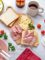 Delicious sandwiches with ham and products