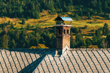 Old chimney on top of the typical slovenian mountain house