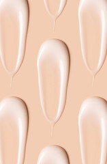 pattern cosmetic smears of creamy texture on a beige background