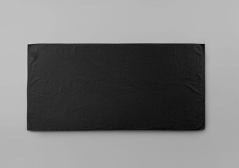 Template of trendy black towel with label isolated on background.