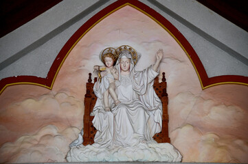 Closeup of Statue of Our lady and Jesus in catholic church, Thailand. selective focus