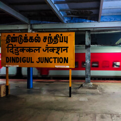 South Indian City name- Dindigul on a railway station Junction platform in tamil language 