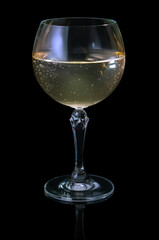 wine glass with champnge isolated on black background