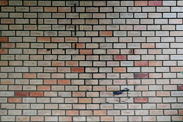 Closeup of Colorful Brick Block Wall texture background for design and decoration at Thailand.