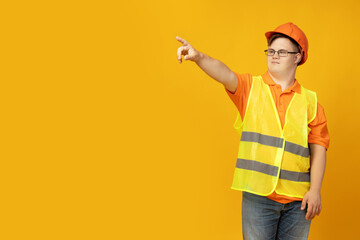 A boy with Down syndrome in the form of a construction worker