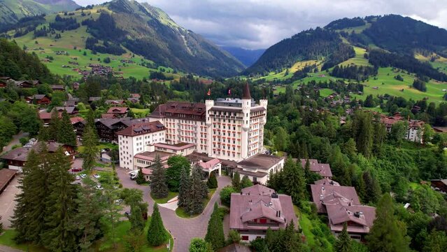 Gstaad - elegant and popular mountain ski resort in Swizerland, canton Bern. aerial drone video