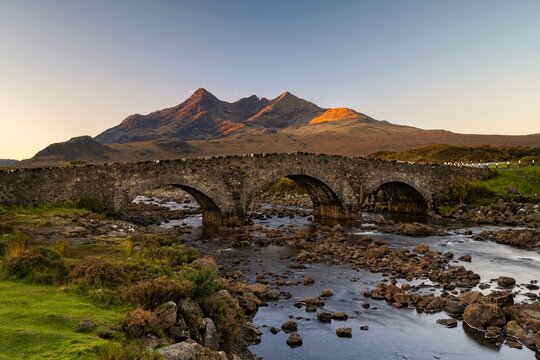 River Sligachan with old stone bridge, Cuillin Mountains in the background, Isle of Skye, Highlands, Inner Hebrides, Scotland, United Kingdom, Europe