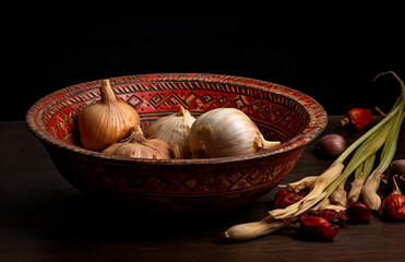 composition with antique dishes and garlic