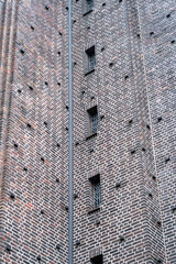 detail of a big brick building in the city