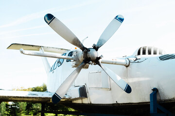 The propeller of an old small passenger plane. The aircraft with four blades is prepared for...