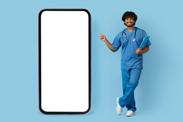 Indian Man Physician In Uniform Pointing Finger At Big Phone