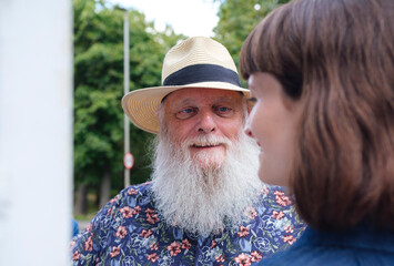 Smiling father looking at daughter