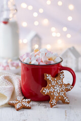Christmas hot chocolate or cocoa with marshmellow in red mug