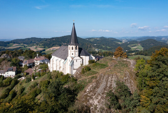 Austria, Upper Austria, Sankt Thomas am Blasenstein, Drone view of rural church and surrounding hills