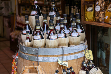 Naklejka premium A shop selling local and typical italian produce in the historic center of San Gimignano, Tuscany.