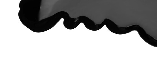 Black viscous liquid flowing on white background