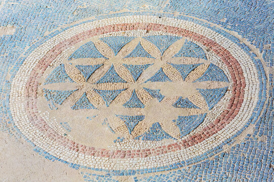 Mosaic floor fragment. Halicarnassus Mausoleum complex. Geometrical pattern. Blue and ochre. Bodrum (Mugla), Turkey (Turkiye)