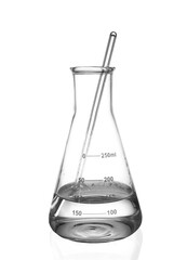 Glass flask with water and stirring rod isolated on white
