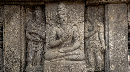 Stone relief on the wall of Prambanan Temple. A Hindu temple located in Yogyakarta, Indonesia