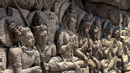 Stone relief on the wall of Prambanan Temple. A Hindu temple located in Yogyakarta, Indonesia