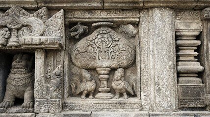 Stone relief on the wall of Prambanan Temple. A Hindu temple located in Yogyakarta, Indonesia