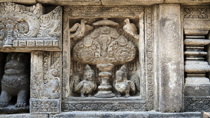 Stone relief on the wall of Prambanan Temple. A Hindu temple located in Yogyakarta, Indonesia