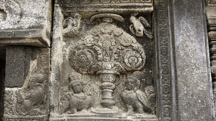 Stone relief on the wall of Prambanan Temple. A Hindu temple located in Yogyakarta, Indonesia