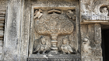 Stone relief on the wall of Prambanan Temple. A Hindu temple located in Yogyakarta, Indonesia