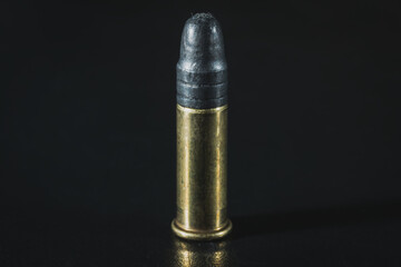 Macro photo, small-caliber cartridge 5.6mm or 22lr. - obrazy, fototapety, plakaty