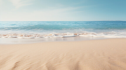Fototapeta na wymiar Empty sand beach in front of summer sea background