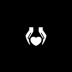 Heart care hands icon on black background 