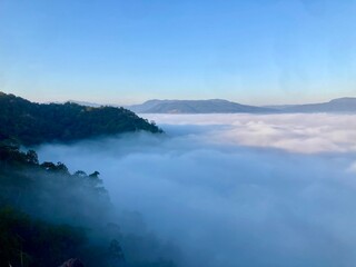 Beautiful sea of mist on the mountains in Thailand, The weather is hot and humid, with a lot of water vapor creating a sea of mist in the foreground in the valley, fog and clouds with mountain hill