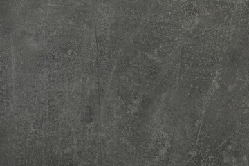 Texture of grey stone surface as background, closeup