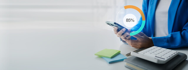 Managing finances and sales of business, displaying holographic graphs of sales and desired goals, planning sales for growth, managing sales, setting strategies for operating a business to make profit