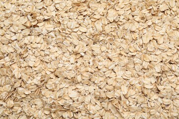 Top view of rolled oats as background