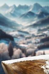 Board cover of snow with frost and blurred landscape of moutains. Christmas mockup background and...