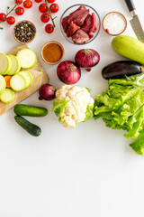 Meat beef stew - raw meat with vegetables for cooking, top view