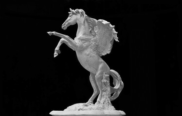 The horse statue is a leap To reach the finish line or victory.