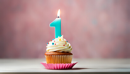 Birthday cupcake with lit birthday candle Number one for one year or first anniversary - obrazy, fototapety, plakaty