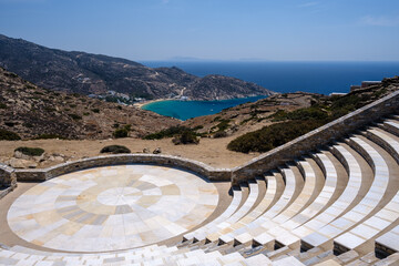 View of the Odysseas Elytis outdoor theatre and the famous Mylopotas beach in the background in Ios...