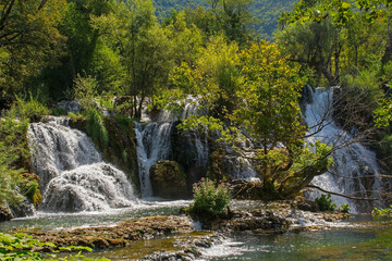 Fototapeta na wymiar Milancev Buk waterfall at Martin Brod in Una-Sana Canton, Federation of Bosnia and Herzegovina. Located within the Una National Park, it is also known as Veliki Buk or Martinbrodski