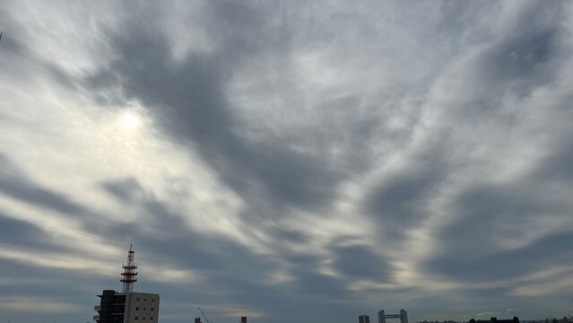 time lapse of clouds over city