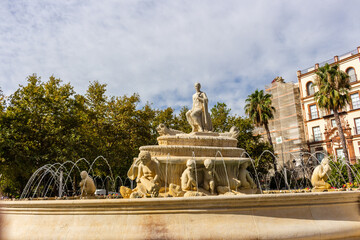 Obraz premium The Fountain of Hispalis (Fuente de Hispalis), located in the Puerta de Jerez, Seville, Andalusia, Spain.