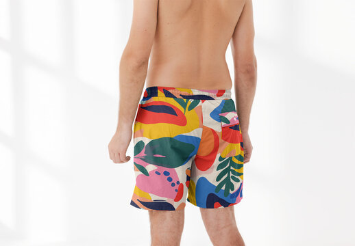 Mockup of man wearing customizable patterned shorts and no top